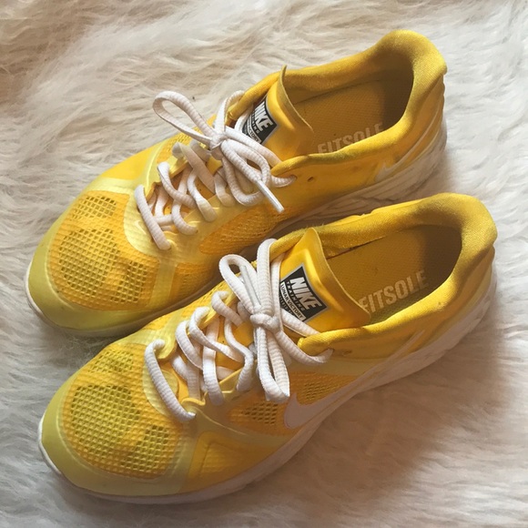 yellow nike training shoes